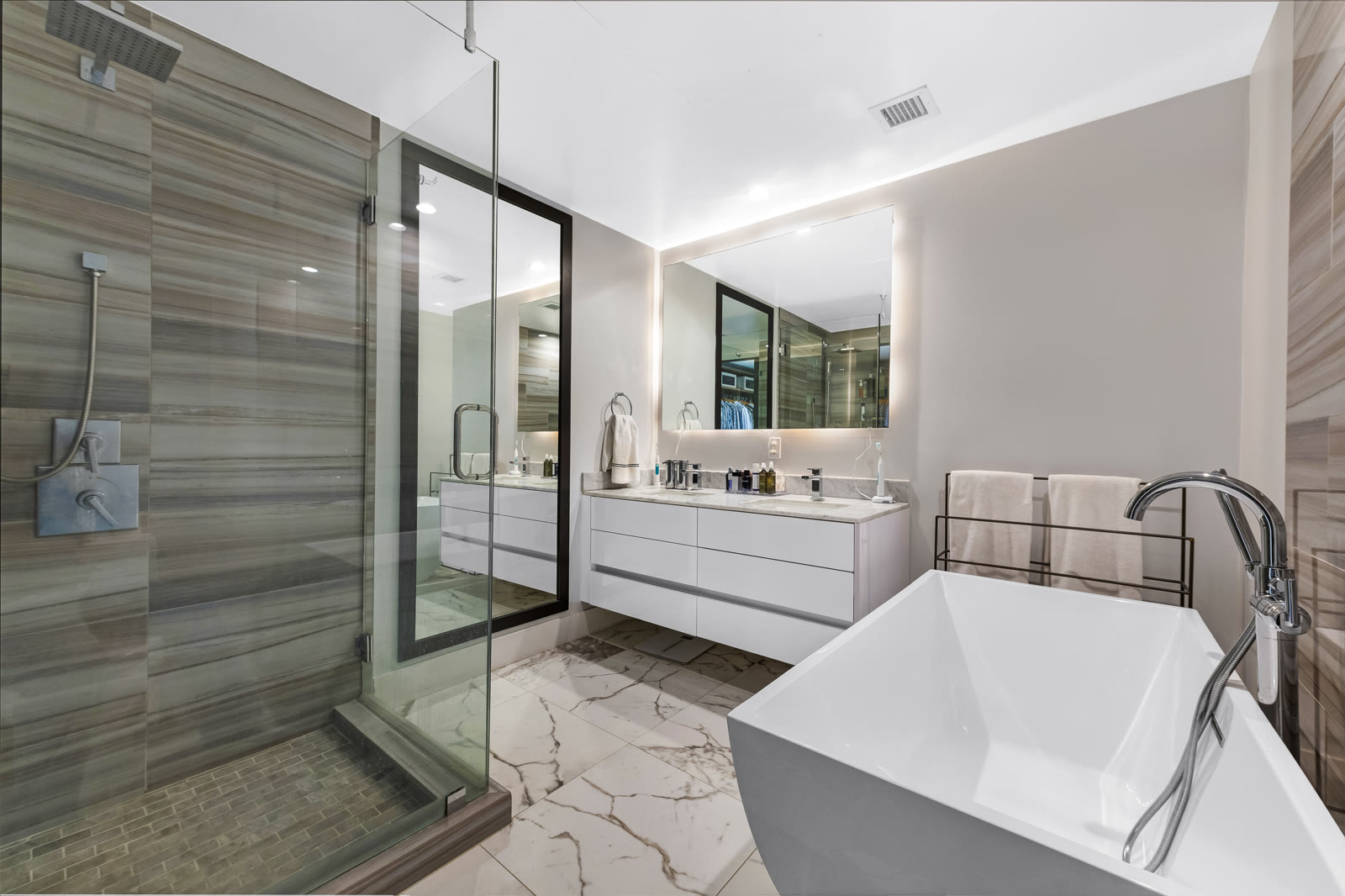 Spa-inspired primary bath with soaking tub